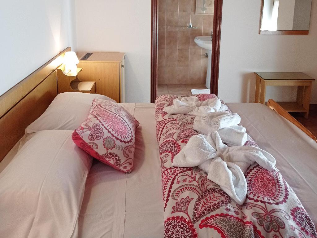 Postel nebo postele na pokoji v ubytování Mini hotel