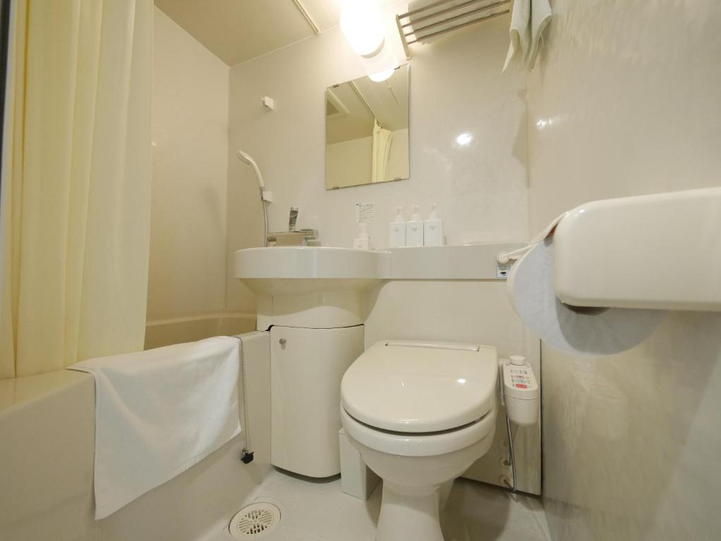 Koupelna v ubytování Hotel Comfybed Ginza