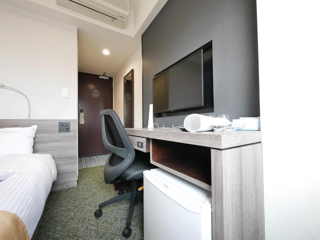 TV a/nebo společenská místnost v ubytování Hotel Comfybed Ginza