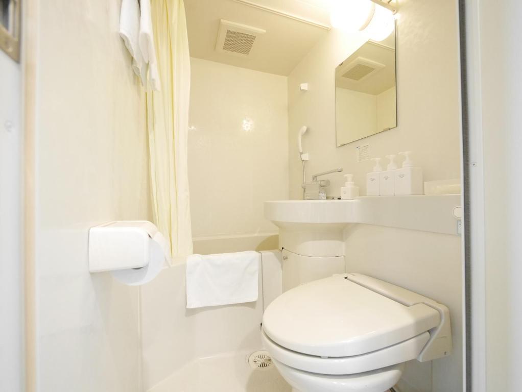 Koupelna v ubytování Hotel Comfybed Ginza