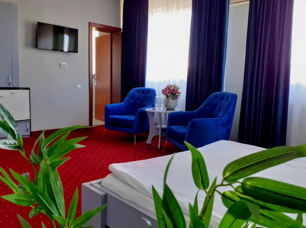 TV a/nebo společenská místnost v ubytování Hotel SunGarden Salin