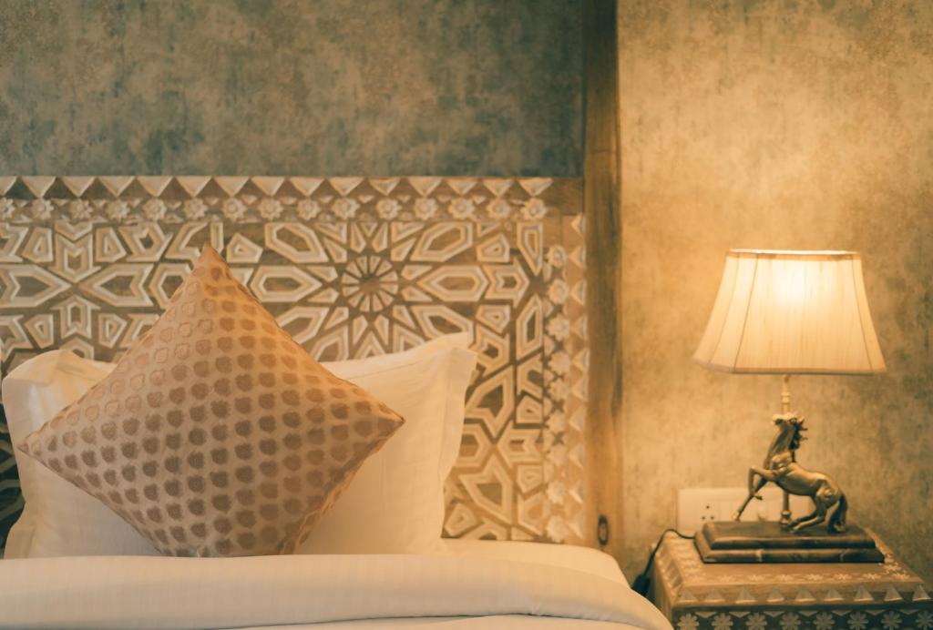 Postel nebo postele na pokoji v ubytování Hotel Jasmin Home