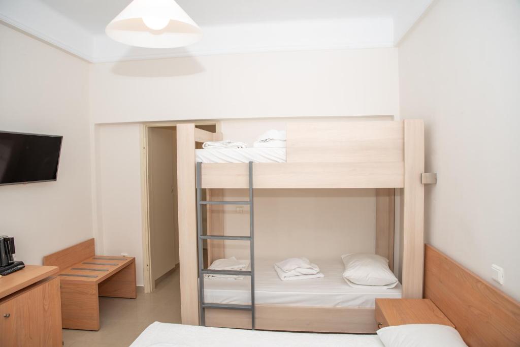 Postel nebo postele na pokoji v ubytování Tosca Beach Hotel