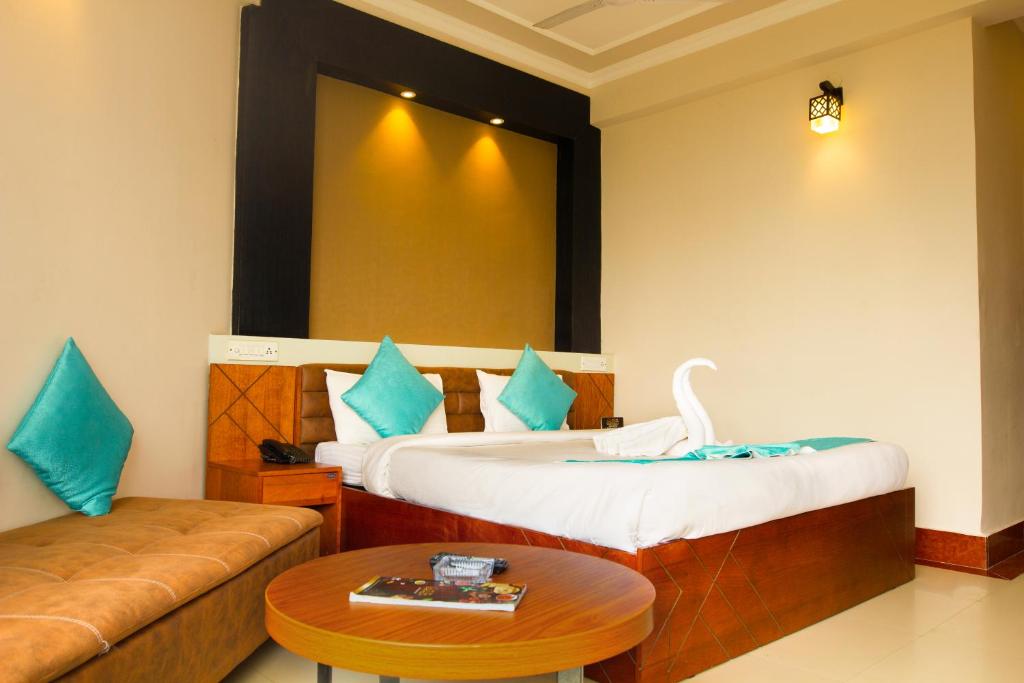 Postel nebo postele na pokoji v ubytování Hotel Sonar Bangla Mandarmoni