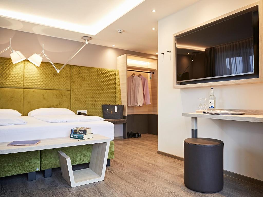 TV a/nebo společenská místnost v ubytování Hotel Die Krone - Immenstadt-Stein