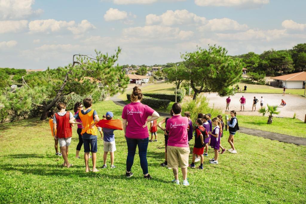 a group of people standing in a field at Belambra Clubs Capbreton - Les Vignes in Capbreton