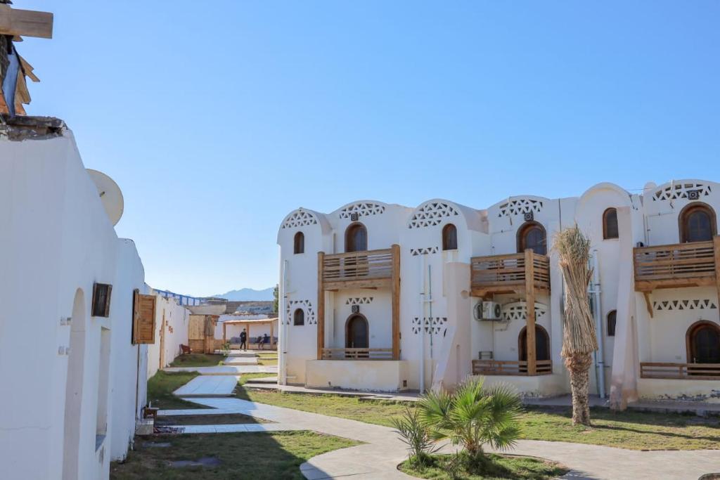 a view of the courtyard of a building at Coral Reefs Hotel Dahab in Dahab