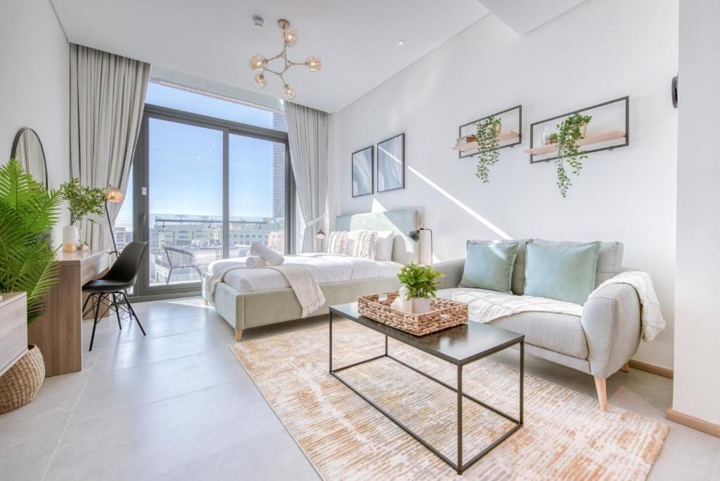 Cosmopolitan Studio at Signature Livings North JVC by Deluxe Holiday Homes