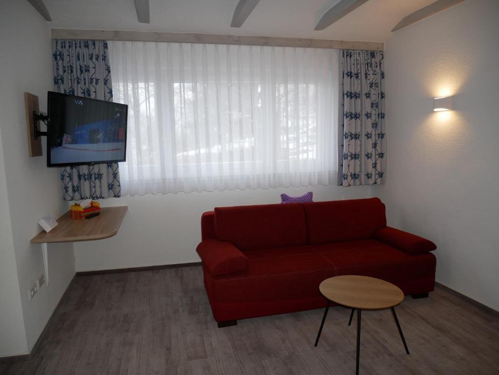 TV a/nebo společenská místnost v ubytování Wochner's Hotel-Sternen Am Schluchsee Hochschwarzwald