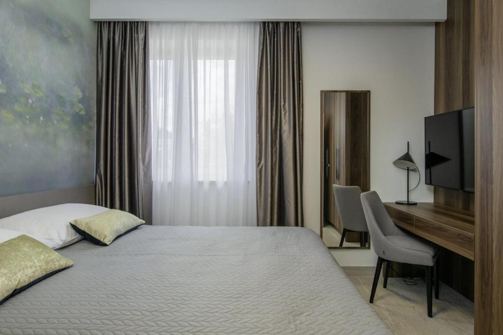 Łóżko lub łóżka w pokoju w obiekcie Villa Valentina in Krnica - Haus für 8-9 Personen