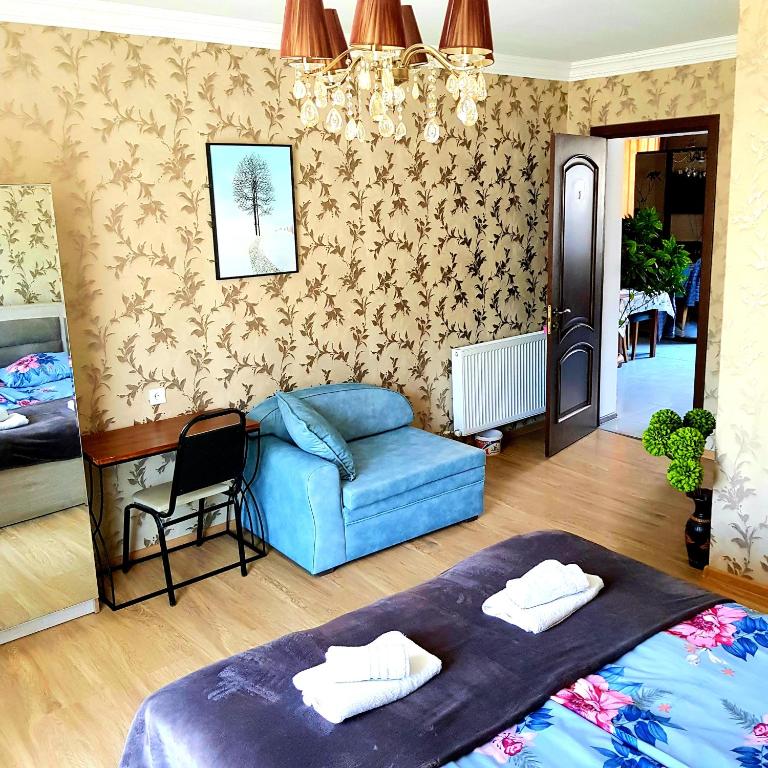 Postel nebo postele na pokoji v ubytování North Kazbegi