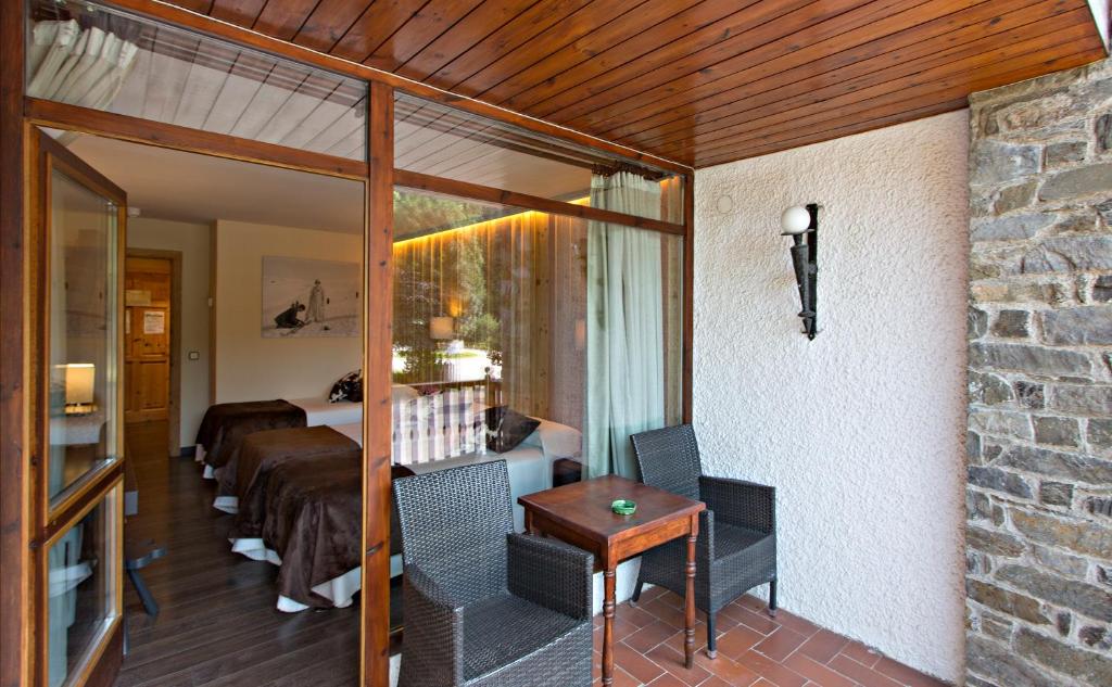 Posezení v ubytování Hotel La Coma