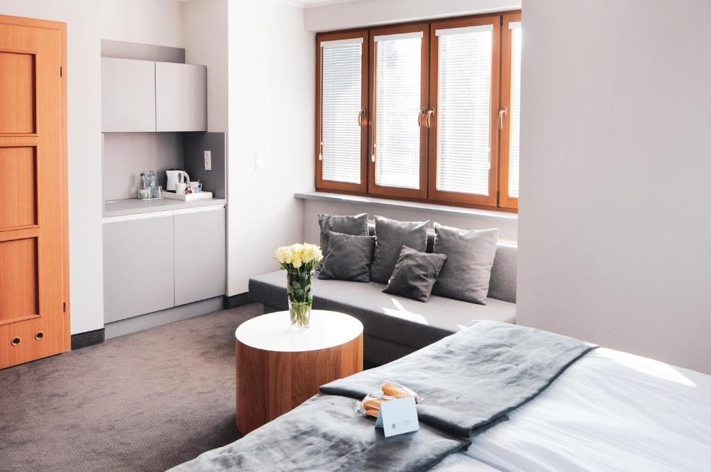 Posteľ alebo postele v izbe v ubytovaní Apartamenty Ciechocinek SPA