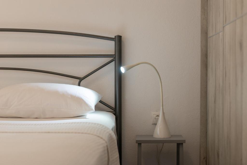Postel nebo postele na pokoji v ubytování CN Studio-Apartment