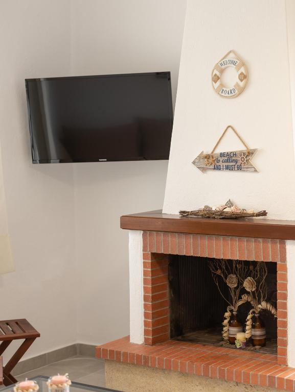 TV a/nebo společenská místnost v ubytování CN Studio-Apartment