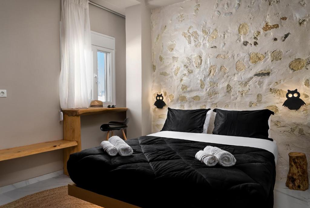 Postel nebo postele na pokoji v ubytování Kipos Hotel