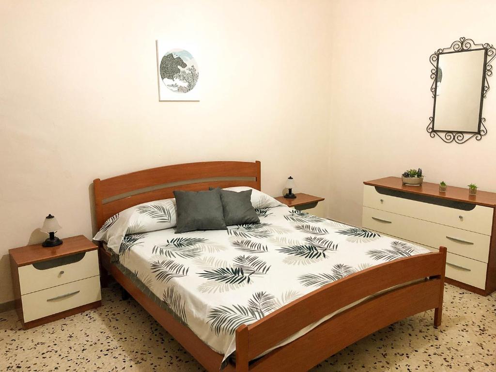 Posteľ alebo postele v izbe v ubytovaní Casa Conchiglia