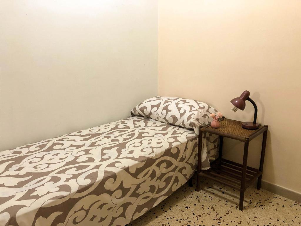 Posteľ alebo postele v izbe v ubytovaní Casa Conchiglia