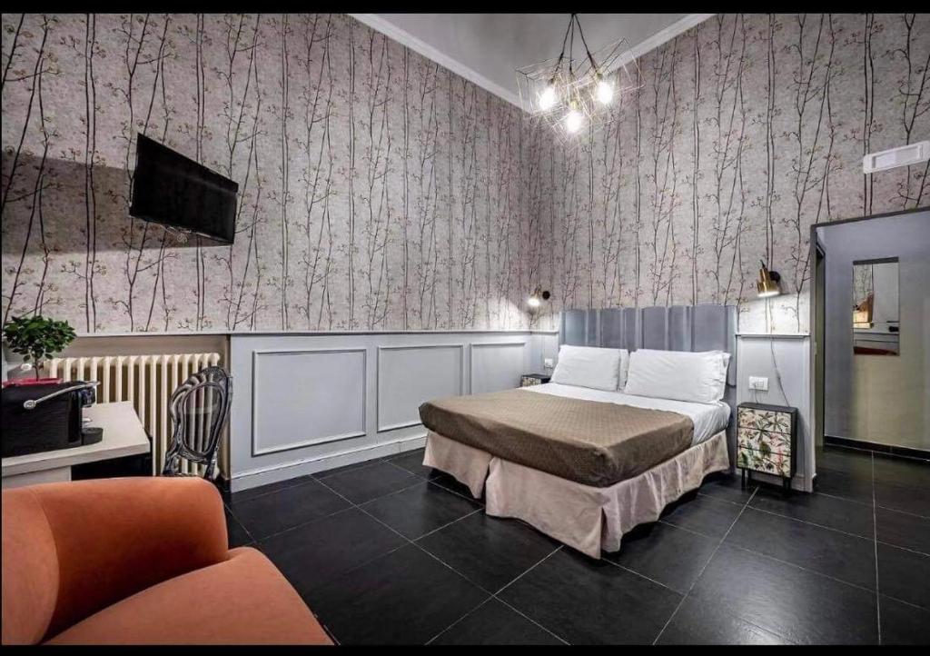 Posteľ alebo postele v izbe v ubytovaní Residenza D'Epoca Al Numero 8