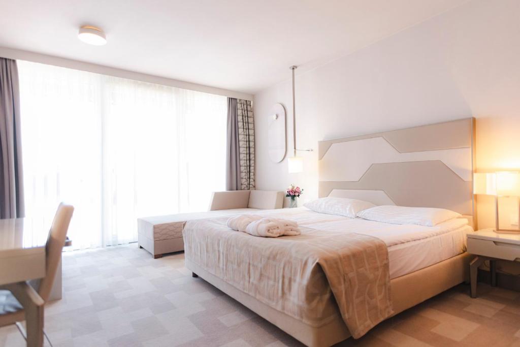 Postel nebo postele na pokoji v ubytování Hotel Terme - Terme Čatež
