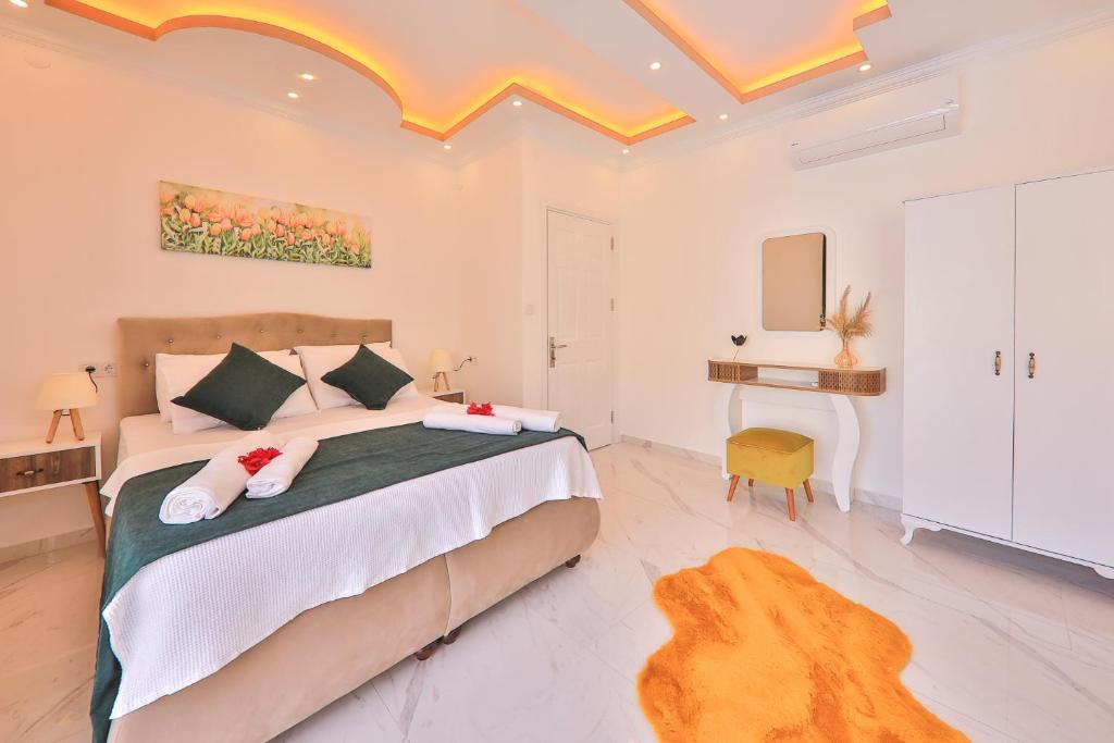 Кровать или кровати в номере Flower Hotel Patara