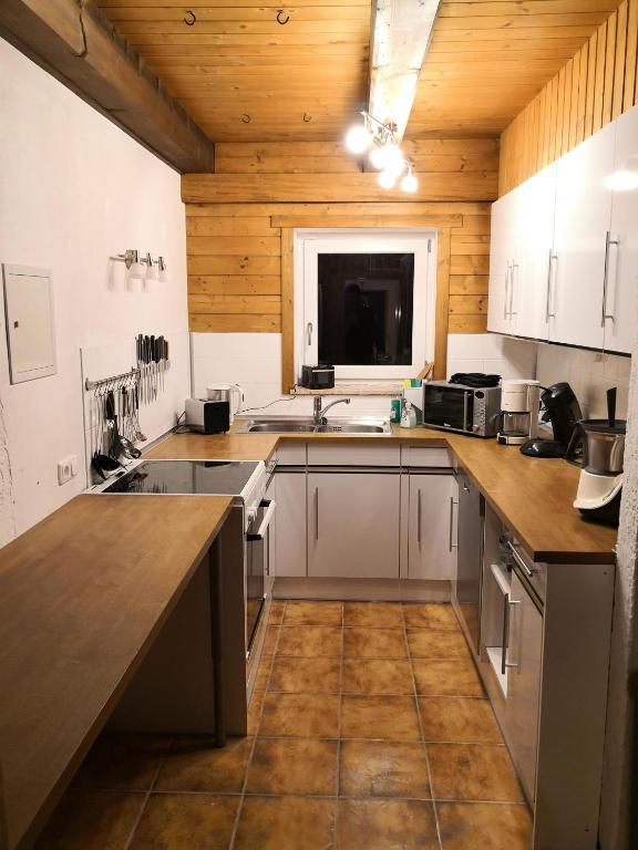 Kuchyň nebo kuchyňský kout v ubytování Alpen Chalet Bramberg