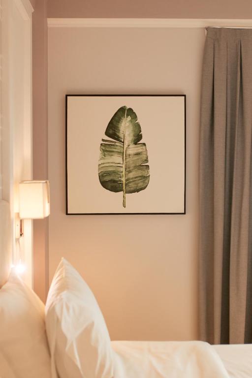 Postel nebo postele na pokoji v ubytování Bisinii Boutique Hotel