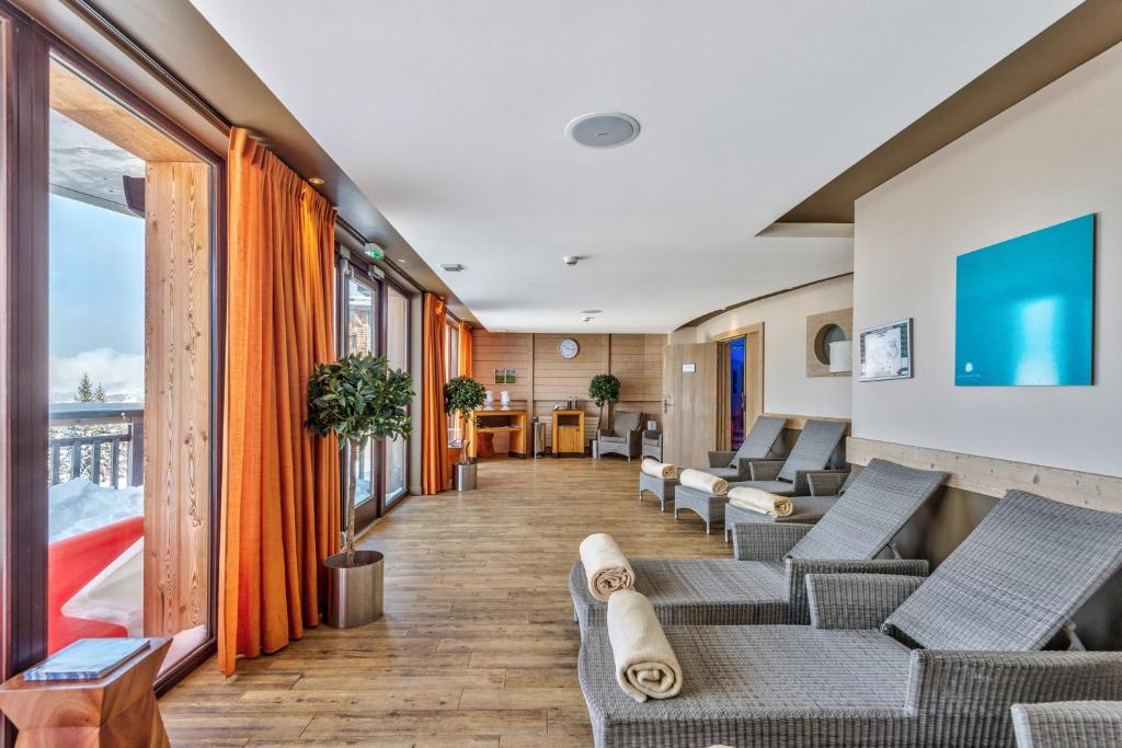 Posezení v ubytování Résidence Pierre & Vacances Premium L'Amara