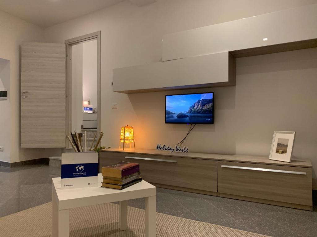 Televízia a/alebo spoločenská miestnosť v ubytovaní House Zena by Holiday World