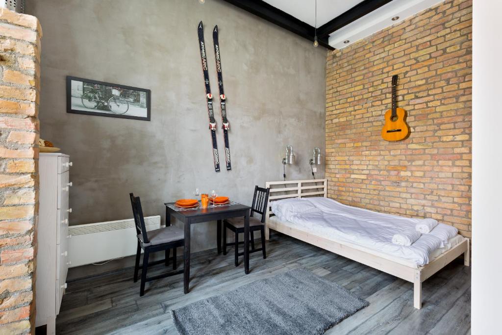 Posteľ alebo postele v izbe v ubytovaní K10 A Kazinczy Apartment