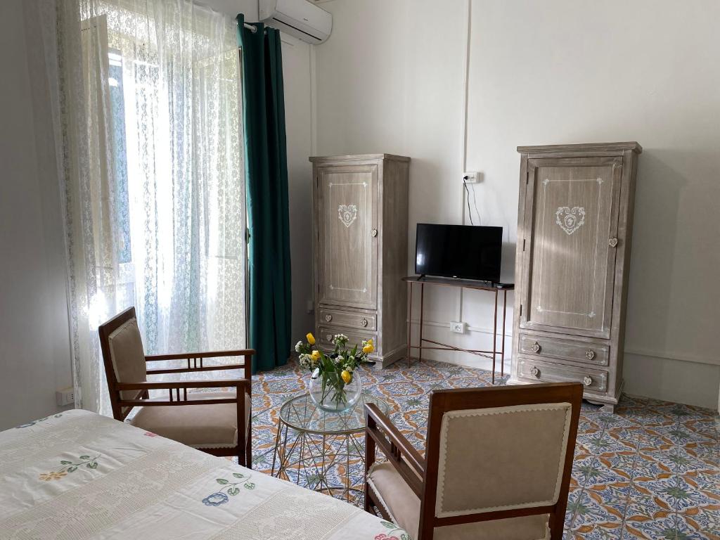 TV a/nebo společenská místnost v ubytování BIANCA ROOMS