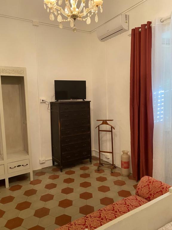 TV a/nebo společenská místnost v ubytování BIANCA ROOMS