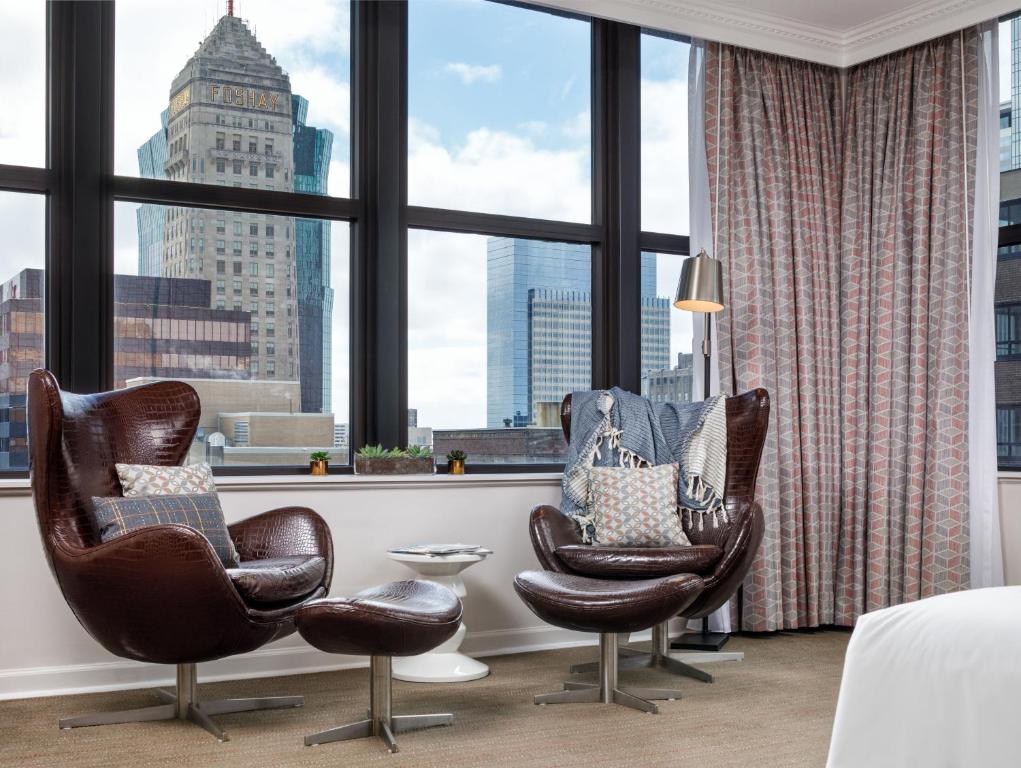 a hotel room with a large window overlooking a city at Hyatt Centric Downtown Minneapolis in Minneapolis