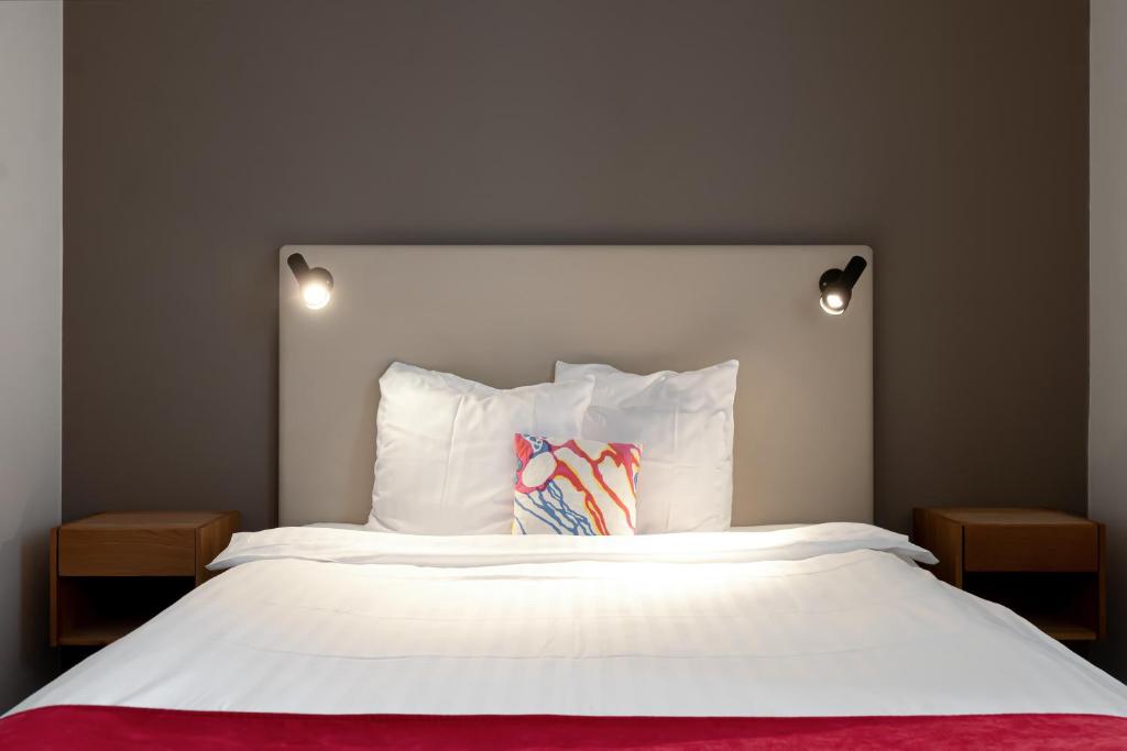 Postel nebo postele na pokoji v ubytování Hotel Bishops Arms Strängnäs