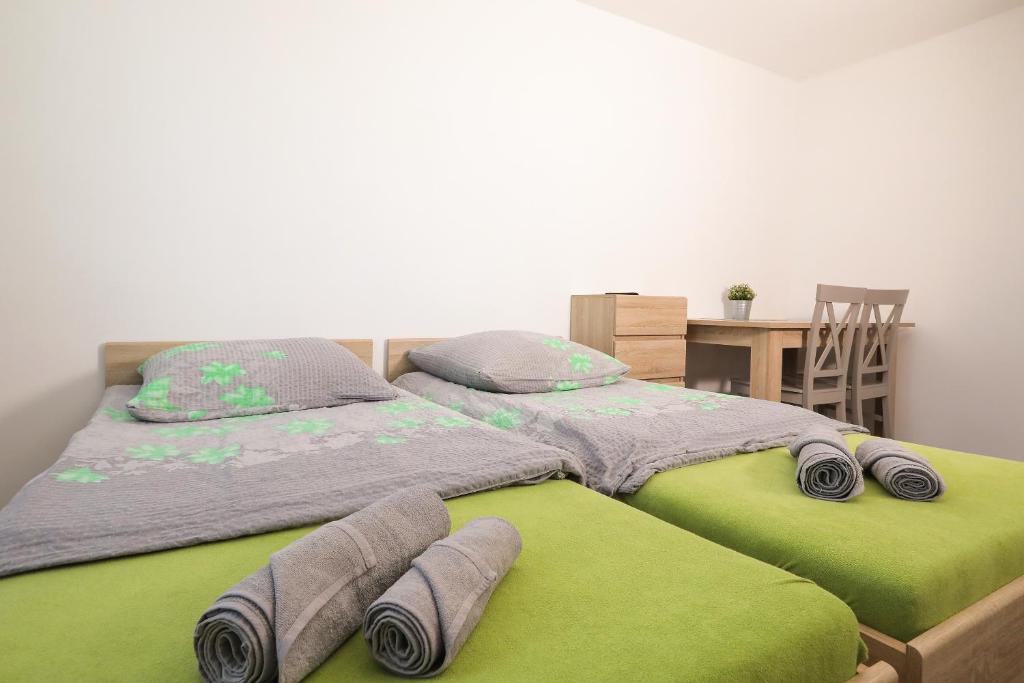 Posteľ alebo postele v izbe v ubytovaní Apartamenty Częstochowa