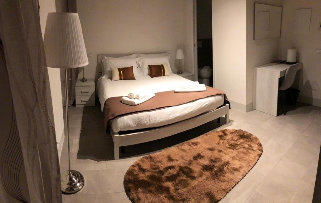 Postel nebo postele na pokoji v ubytování Casa Carducci 33