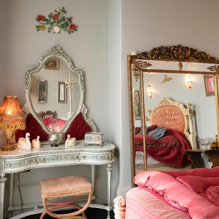 Postel nebo postele na pokoji v ubytování La Rosa Hotel