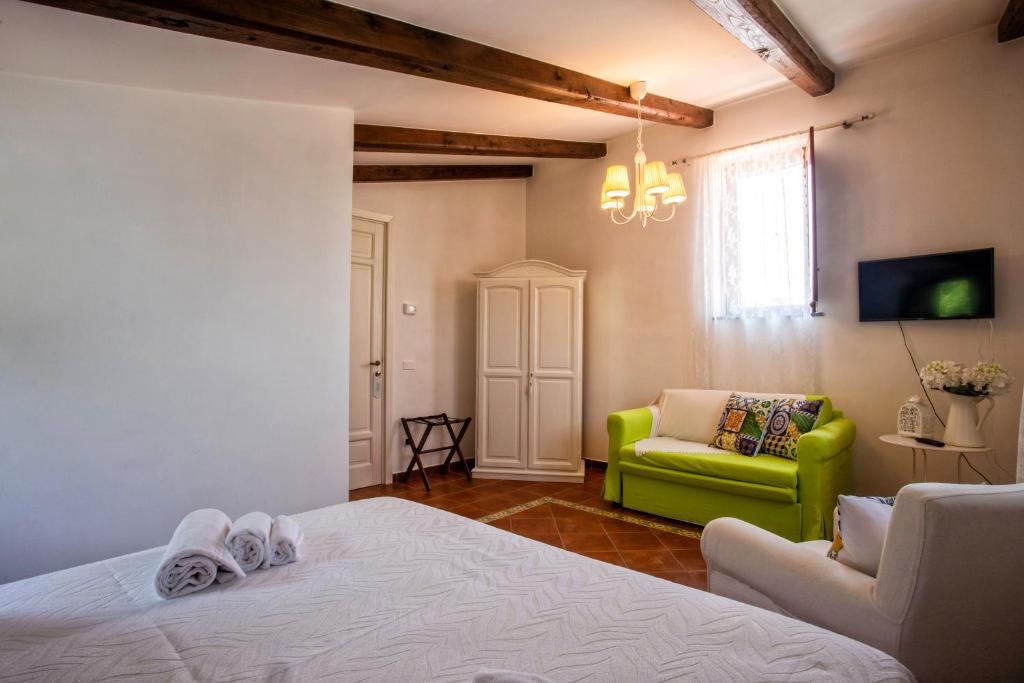 Postel nebo postele na pokoji v ubytování Agriturismo Il Convento