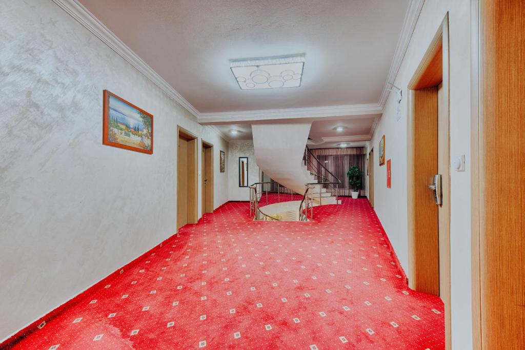 Postel nebo postele na pokoji v ubytování Hotel Lion