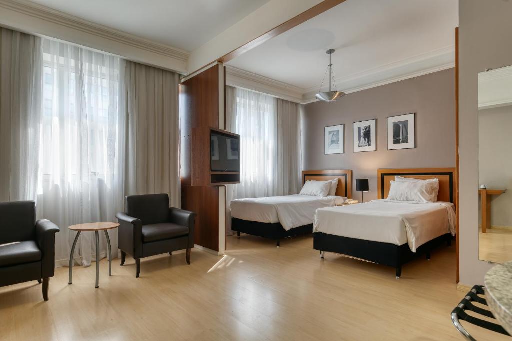 Cama ou camas em um quarto em Mercure Belo Horizonte Savassi