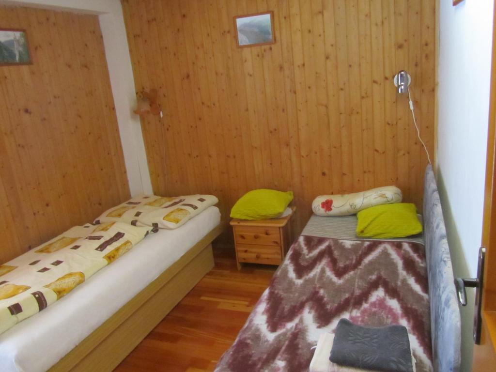 Posteľ alebo postele v izbe v ubytovaní Privát Sokolie