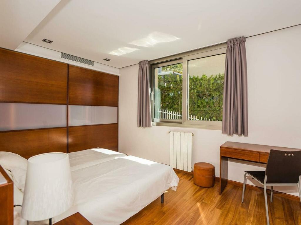 A bed or beds in a room at Belvilla by OYO Sammy