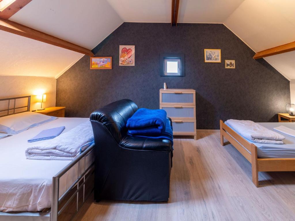 Postel nebo postele na pokoji v ubytování Holiday Home in Ardennes near La Roche Castle