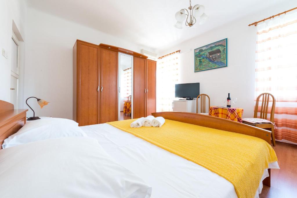 Letto o letti in una camera di AVA Studio apartment and Room