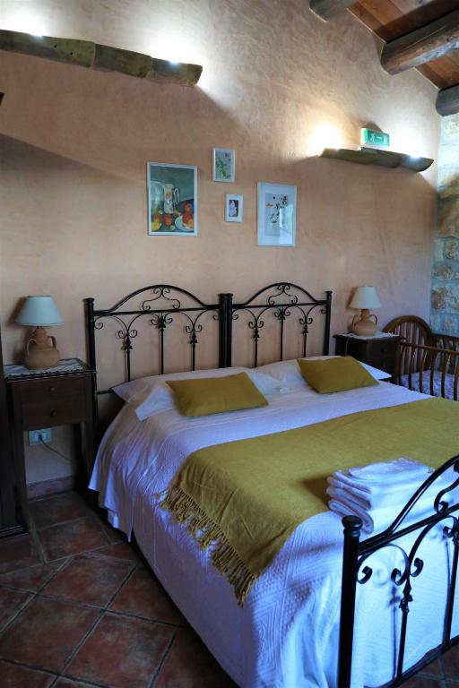 Postel nebo postele na pokoji v ubytování B&B Villa Giusy