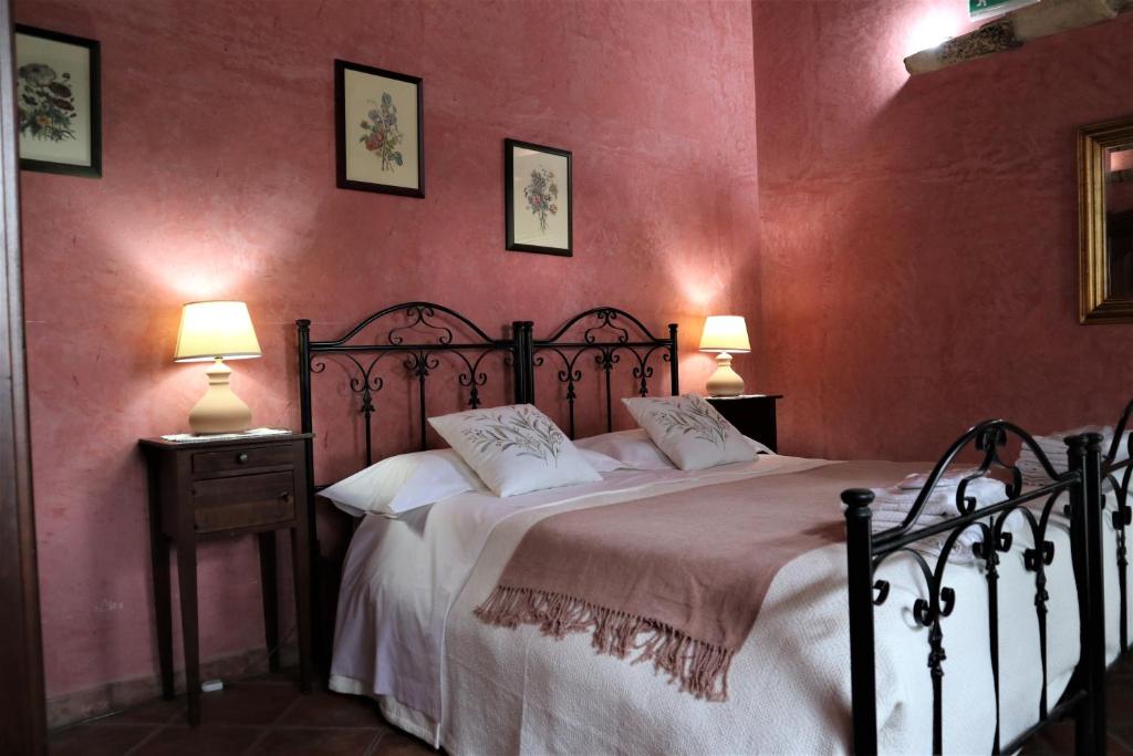Postel nebo postele na pokoji v ubytování B&B Villa Giusy