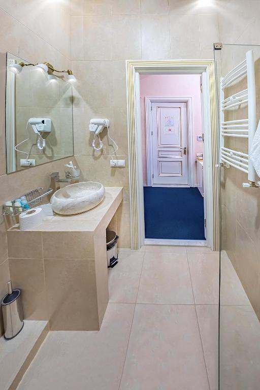 Koupelna v ubytování Vintage Hotel