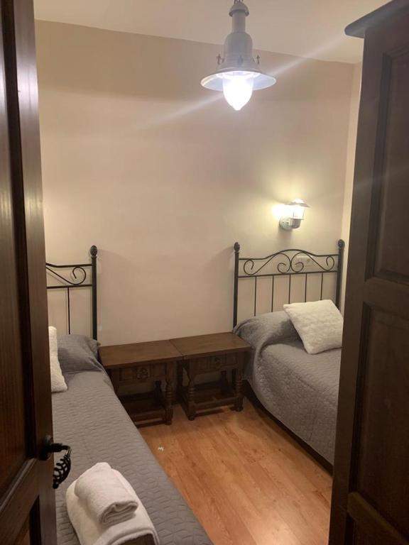 Posteľ alebo postele v izbe v ubytovaní La Casa Verde en Sanabria de 4 habitaciones y 2 baños