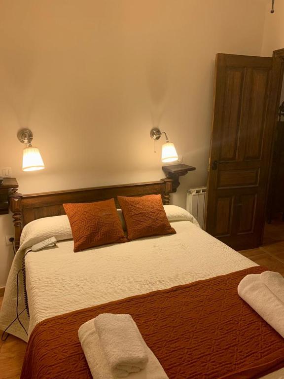 Posteľ alebo postele v izbe v ubytovaní La Casa Verde en Sanabria de 4 habitaciones y 2 baños
