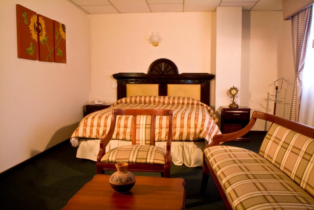 Postel nebo postele na pokoji v ubytování Hotel Podocarpus